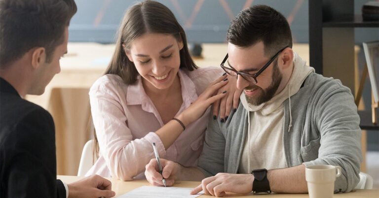 young couple signing a contract gettyimages 994164740 1200w 628h