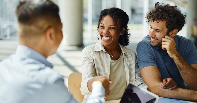 young couple with agent in office gettyimages 1785631455 1200w 628h